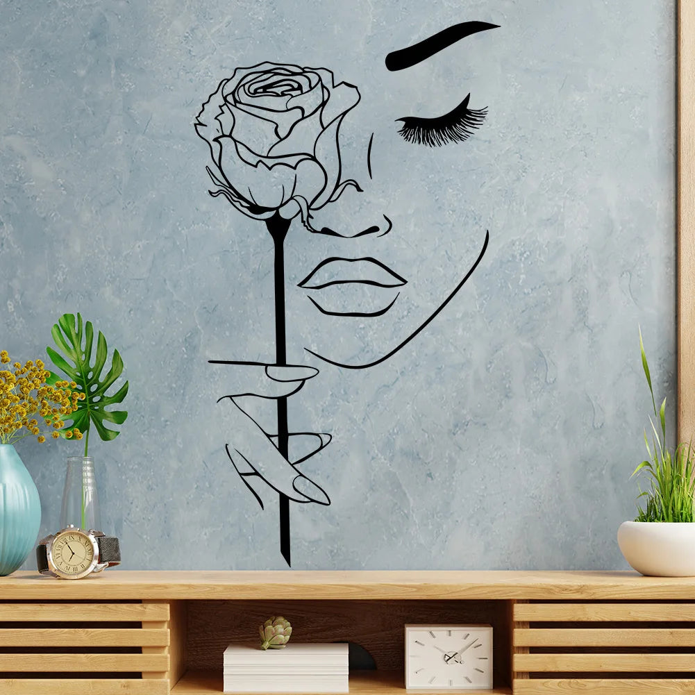 Autocollant mural - femme avec rose 75x42cm